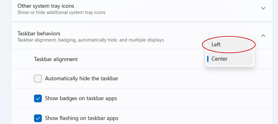 Screenshot of Taskbar behaviors menu. It shows the Taskbar alignment dropdown and Left is circled.